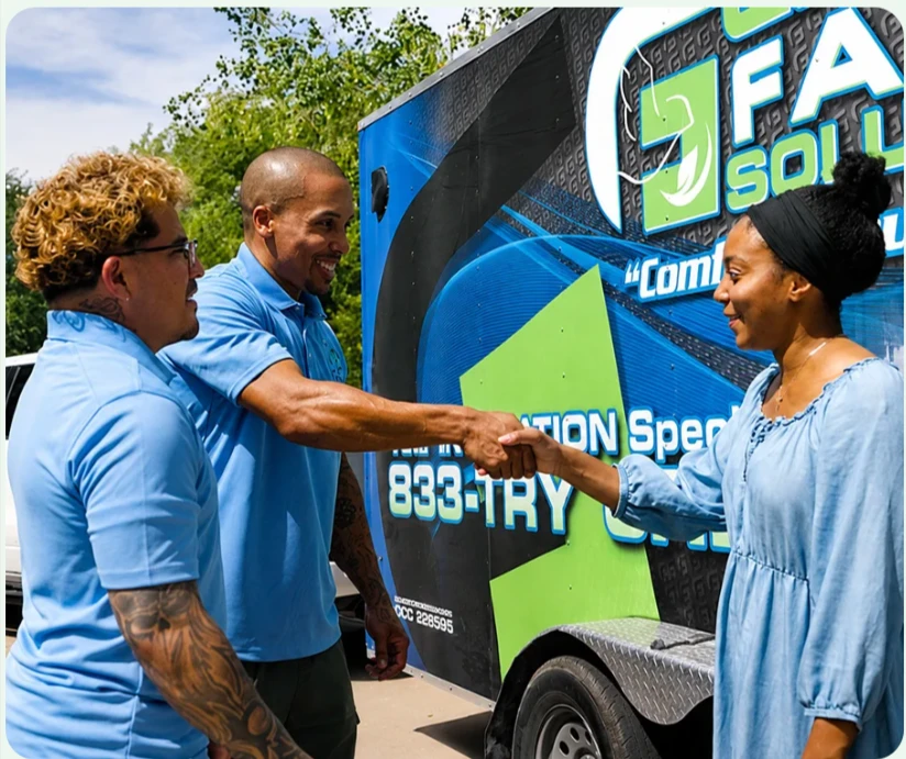 Green Faith Solutions team greeting a homeowner